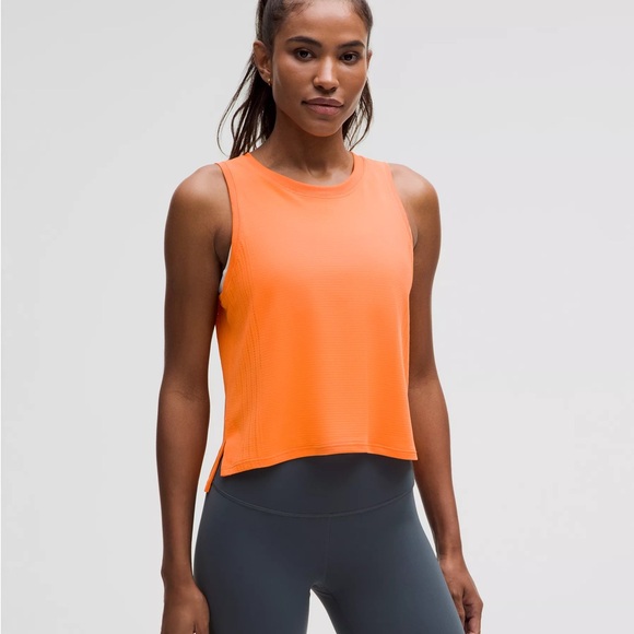 LULULEMON TRAIN TO BE TANK IN ORANGE FRAPPE SIZE SMALL MED. NO TAG prob a 6. - Picture 7 of 7